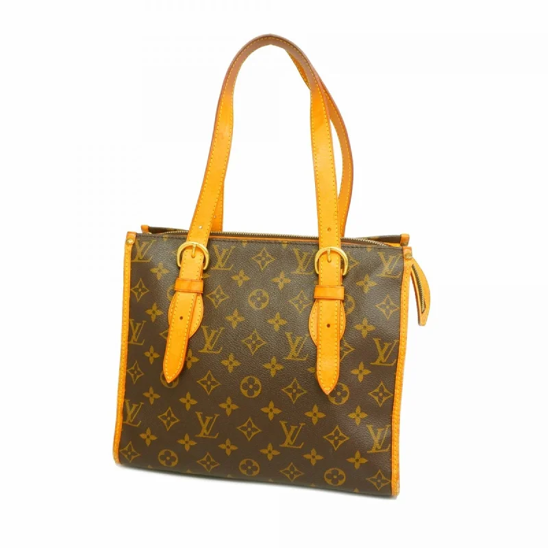 Designer handle bags with luxury logo detailing -Louis Vuitton  Tote Bag (Pre-Owned)