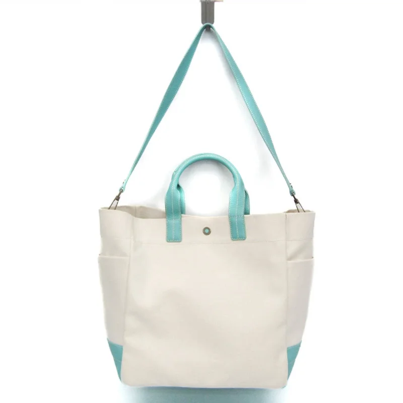 Handle bags with soft leather for luxury -Tiffany Off- Tiffany blue Canvas Leather Shoulder Bag Tote Bag (Pre-Owned)