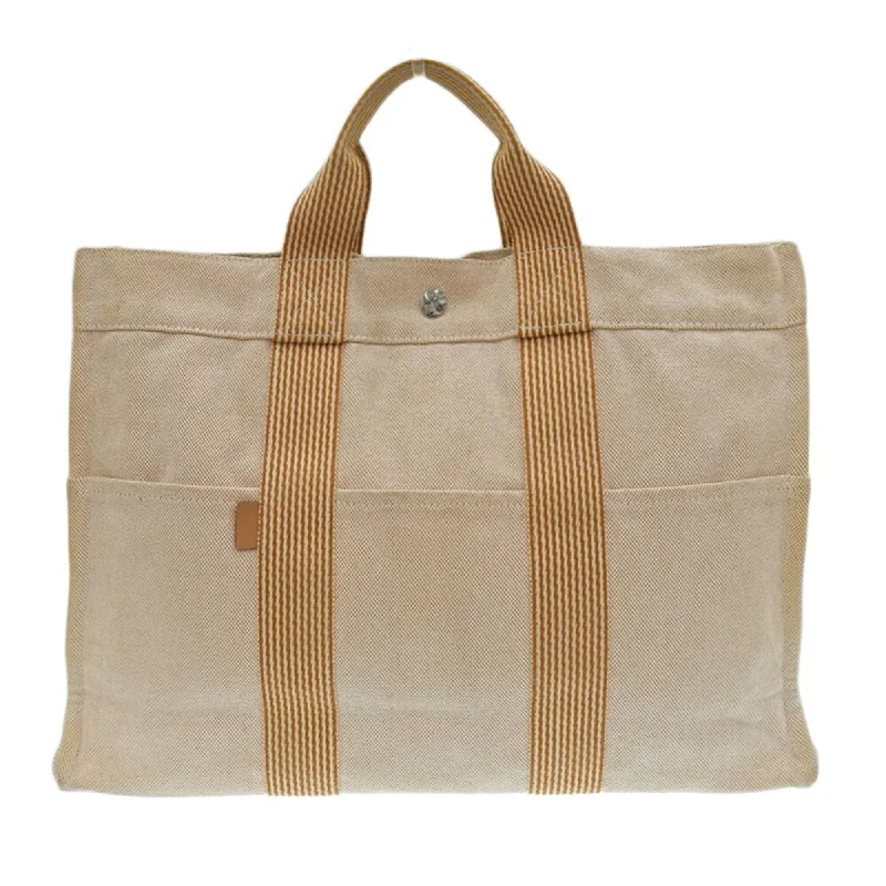 Small handle bags perfect for quick trips -Hermes  Canvas Handbag Tote Bag (Pre-Owned)