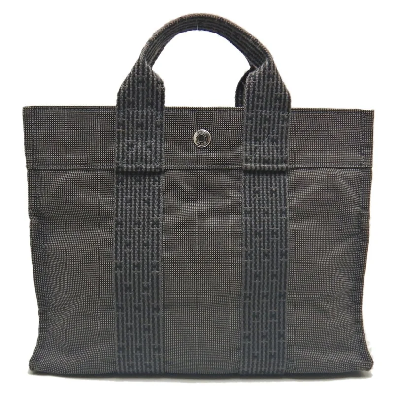 Handle bags with bold logos for branding -Hermes  Nylon Canvas Tote Bag (Pre-Owned)