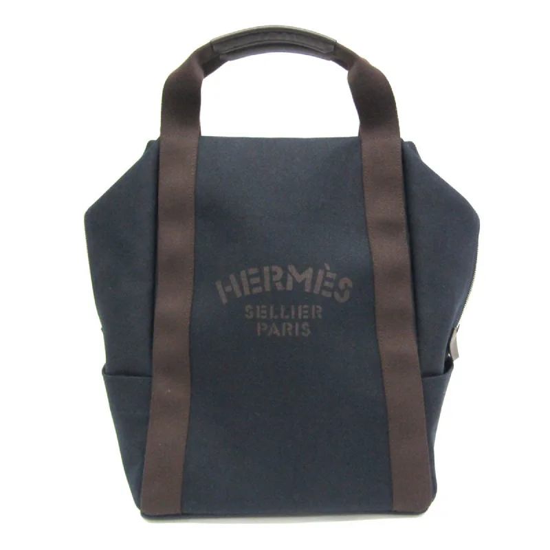 Handle bags with side pockets for organization -Hermes  Toile Chevron Leather Backpack (Pre-Owned)