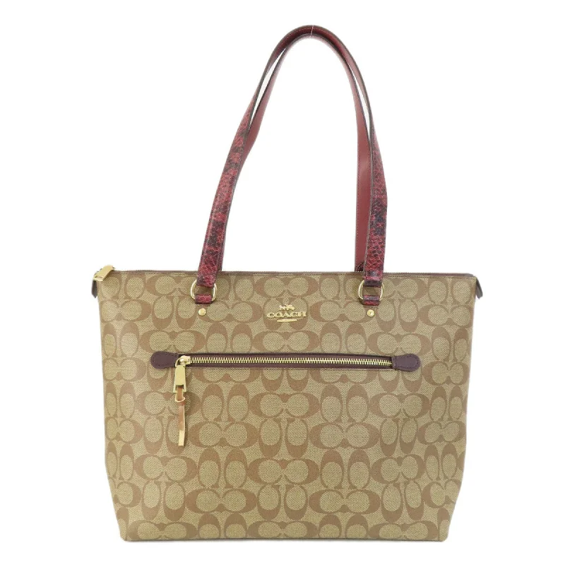 Handle bags with playful patterns for fun -Coach Signature  Signature Line Tote Bag (Pre-Owned)