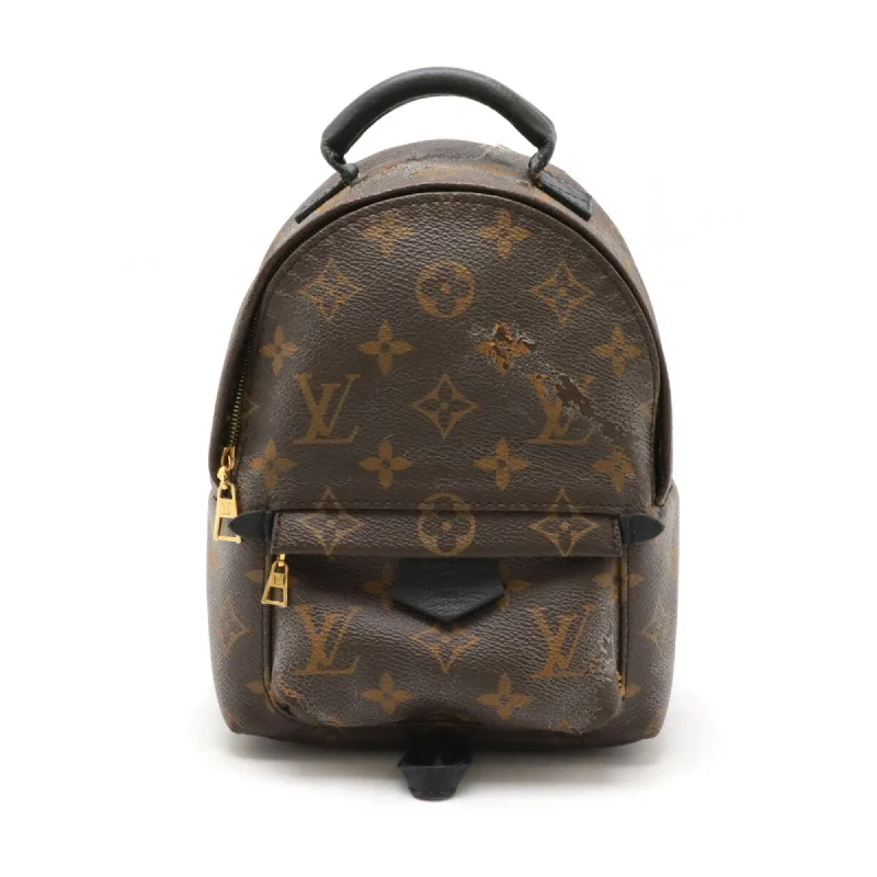 Handle bags with playful pom-poms for charm -Louis Vuitton Monogram Monogram Leather Backpack (Pre-Owned)