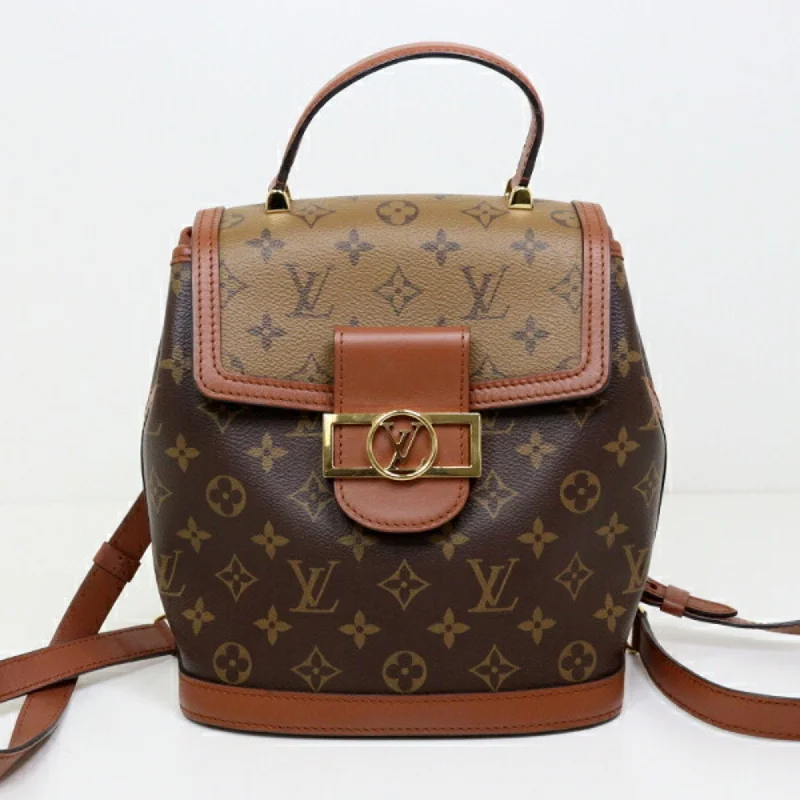 Handle bags with geometric patterns for modernity -Louis Vuitton Monogram Reverse   Monogram Monogram Reverse Monogram Backpack (Pre-Owned)