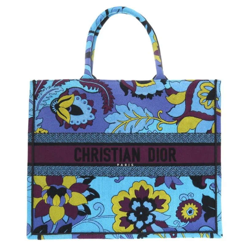 Handle bags with playful pom-poms for charm -Christian Dior blue  Canvas Tote Bag (Pre-Owned)