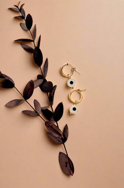 Best hoop earrings with minimal embellishments for a sleek and modern look-Evil Eye Huggie Hoops