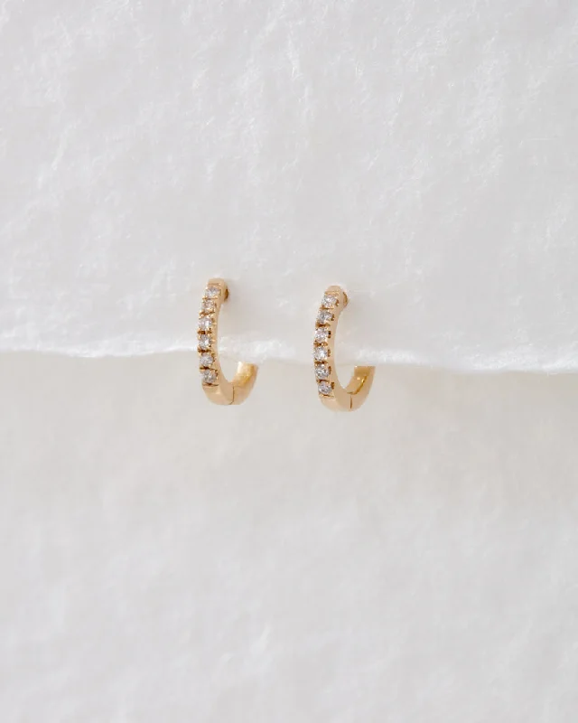 Hoop earrings with circle designs for a classic and timeless shape-The Tiniest Diamond Huggies