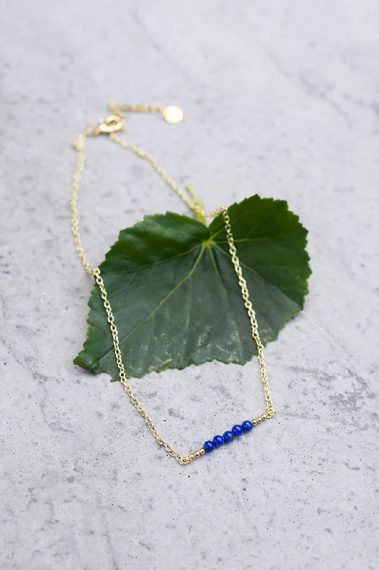 Best necklaces and pendants with statement designs for a fashionable accessory-Lapis & Gold Bead Bar Necklace